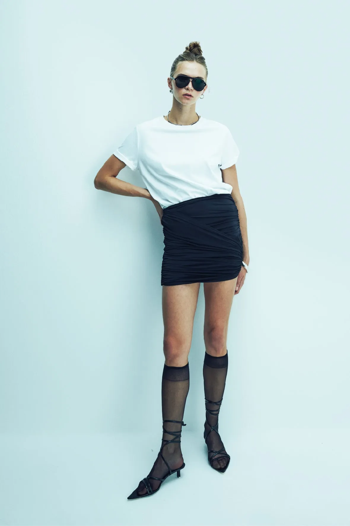 Micha Jersey Asymmetric Mini Skirt in Black