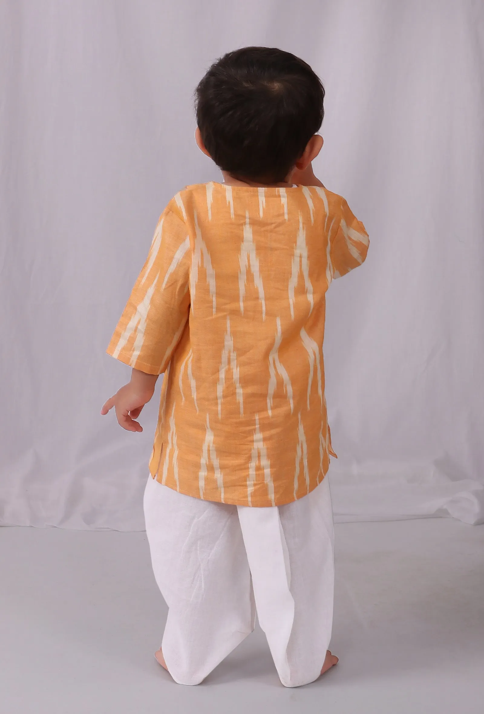 Set of 2: Mustard Yellow Ikat Kurta with White Dhoti Pants