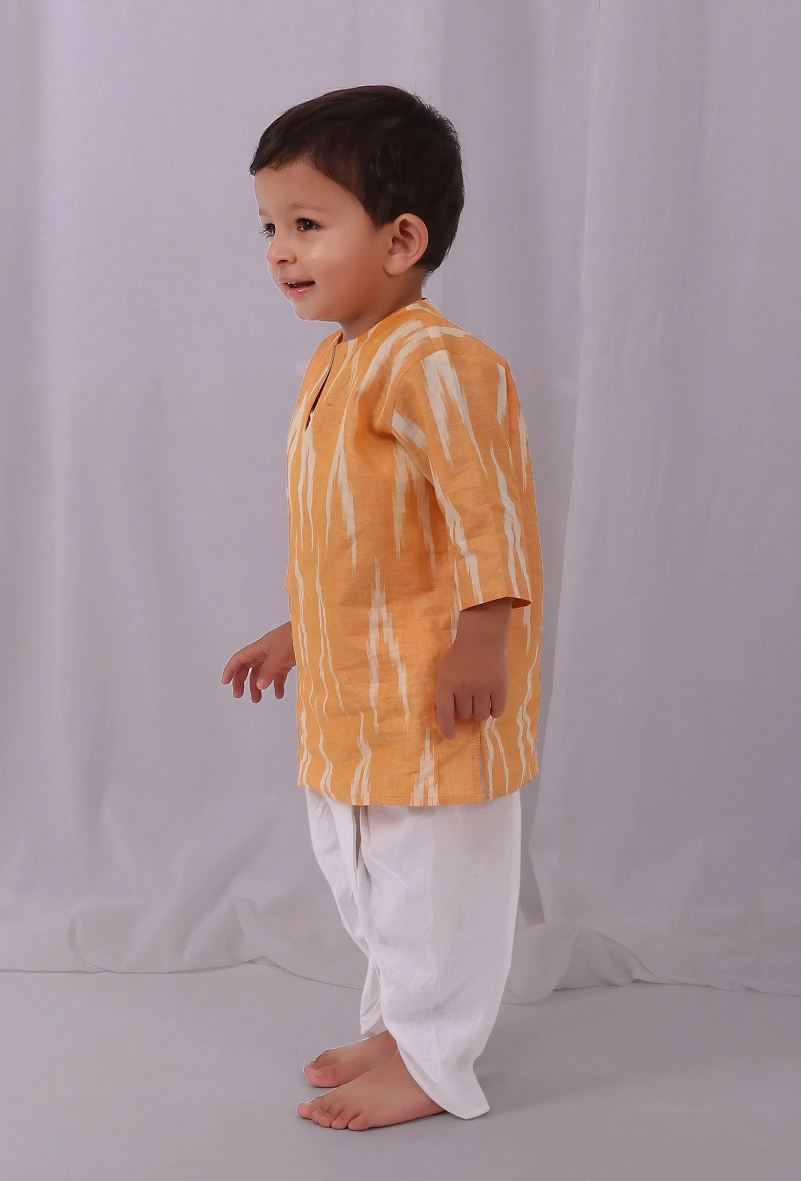 Set of 2: Mustard Yellow Ikat Kurta with White Dhoti Pants